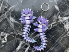 Fluffy Mascots™ Dragón Articulado