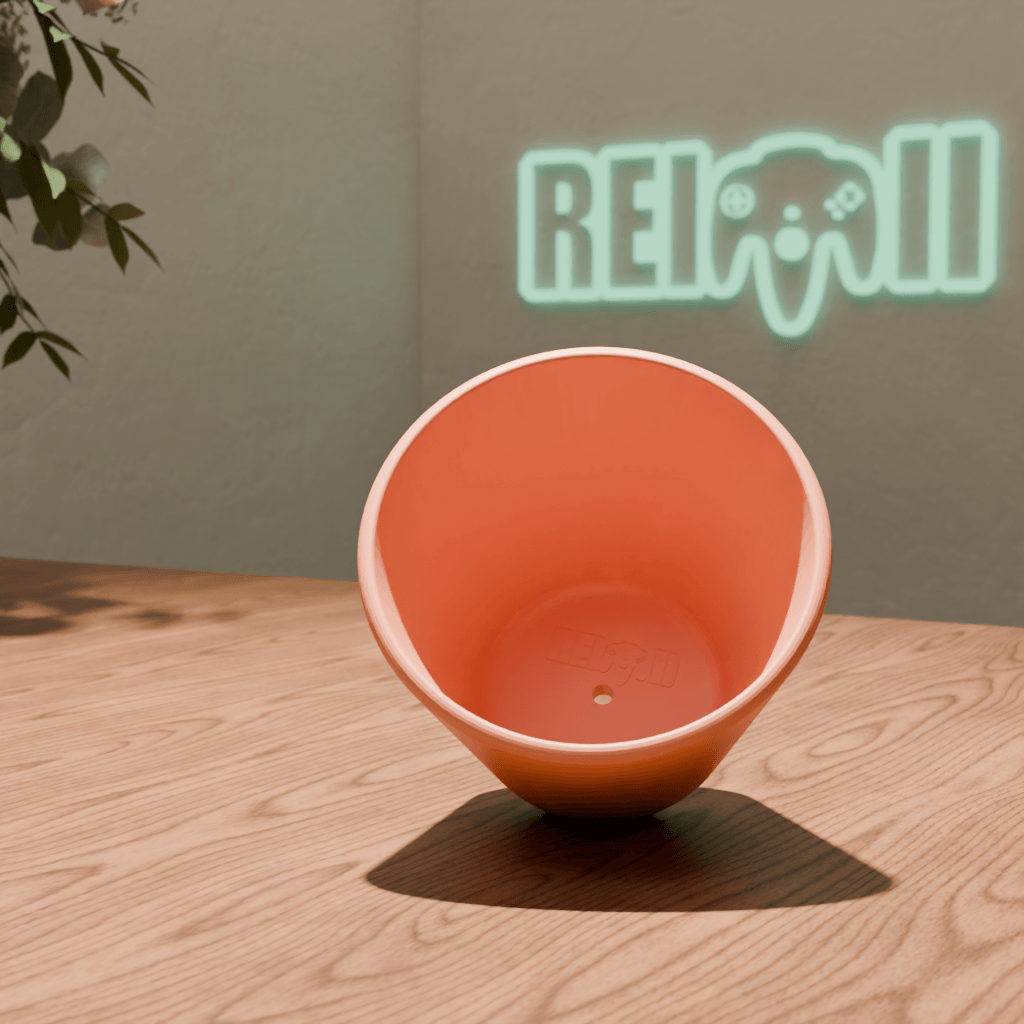 Maceta minimalista impresa en 3D en color terracota con acabado mate sobre mesa de madera